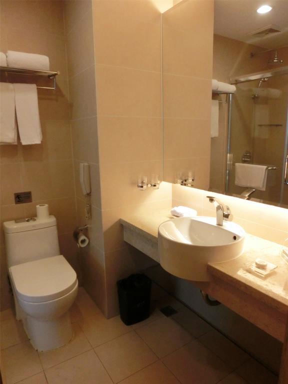 Guangzhou Bauhinia Hotel Habitación foto