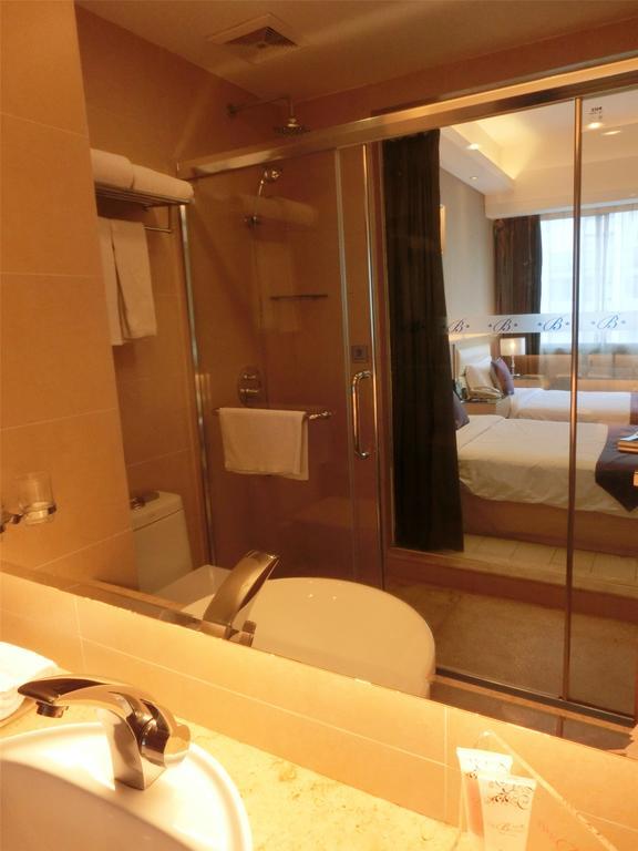 Guangzhou Bauhinia Hotel Habitación foto