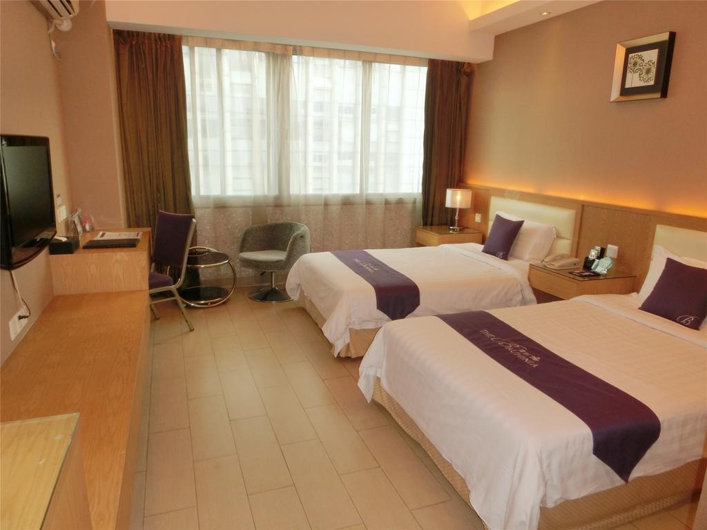 Guangzhou Bauhinia Hotel Habitación foto