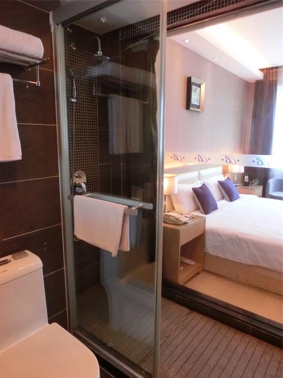 Guangzhou Bauhinia Hotel Habitación foto
