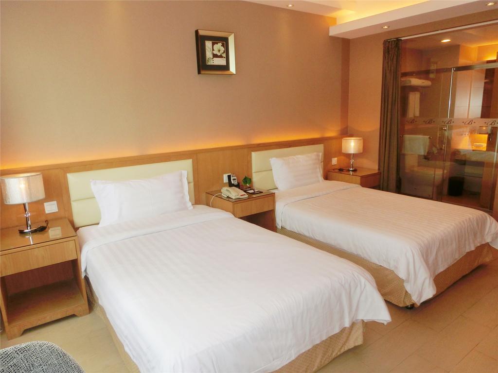Guangzhou Bauhinia Hotel Habitación foto