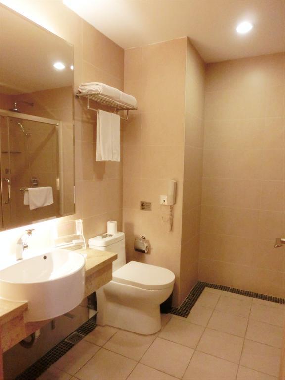 Guangzhou Bauhinia Hotel Habitación foto