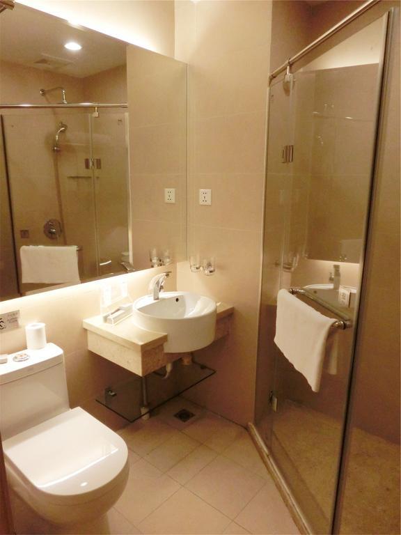 Guangzhou Bauhinia Hotel Habitación foto